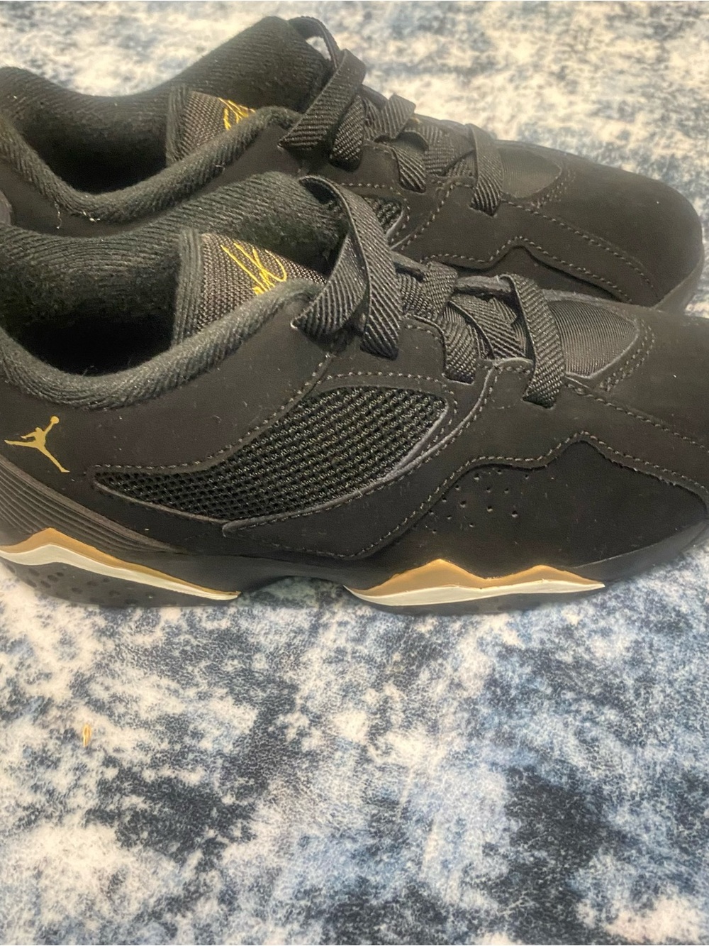Air Jordan Black and Gold Low Top Sneakers